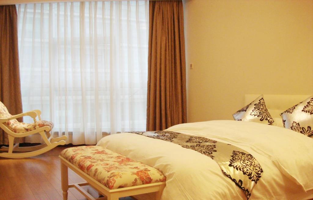 Hangzhou Yilin Hotel Apartment Szoba fotó